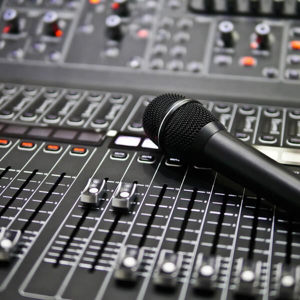 microphone laying on a audio board