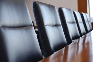 Room 208 is a formal boardroom accomodating 26 guests