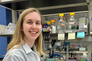 Rebecca Schelling at her lab bench at West Campus