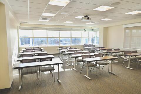 Configured for classroom style, Room 218 accommodates up to 30 guests